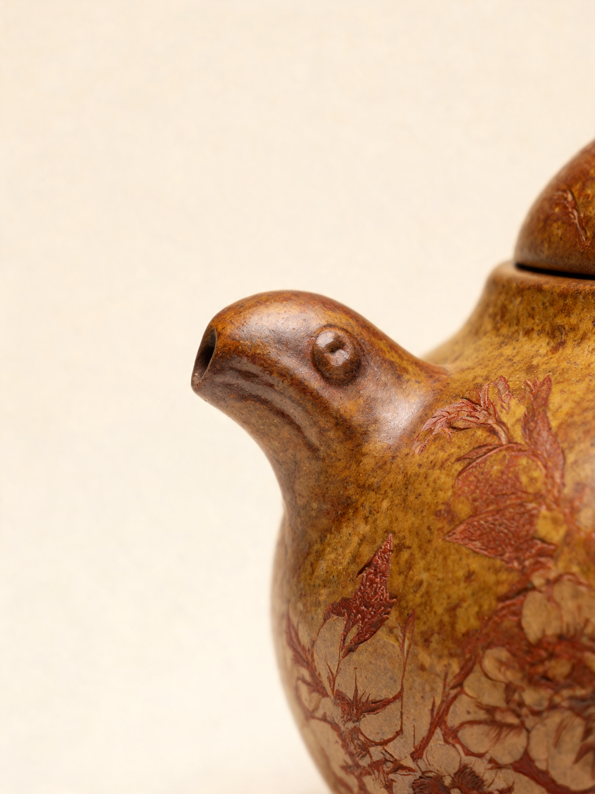 Hulu teapot in warm Duan clay shown from a side angle