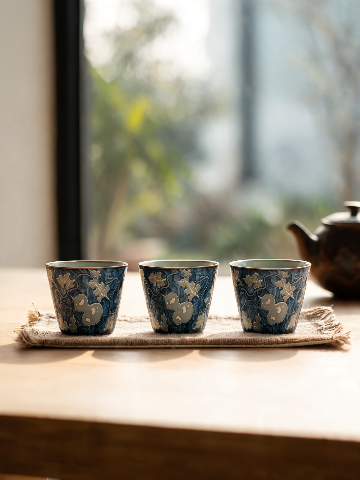 Indigo Gourd Cup compact rounded body in high fired ceramic