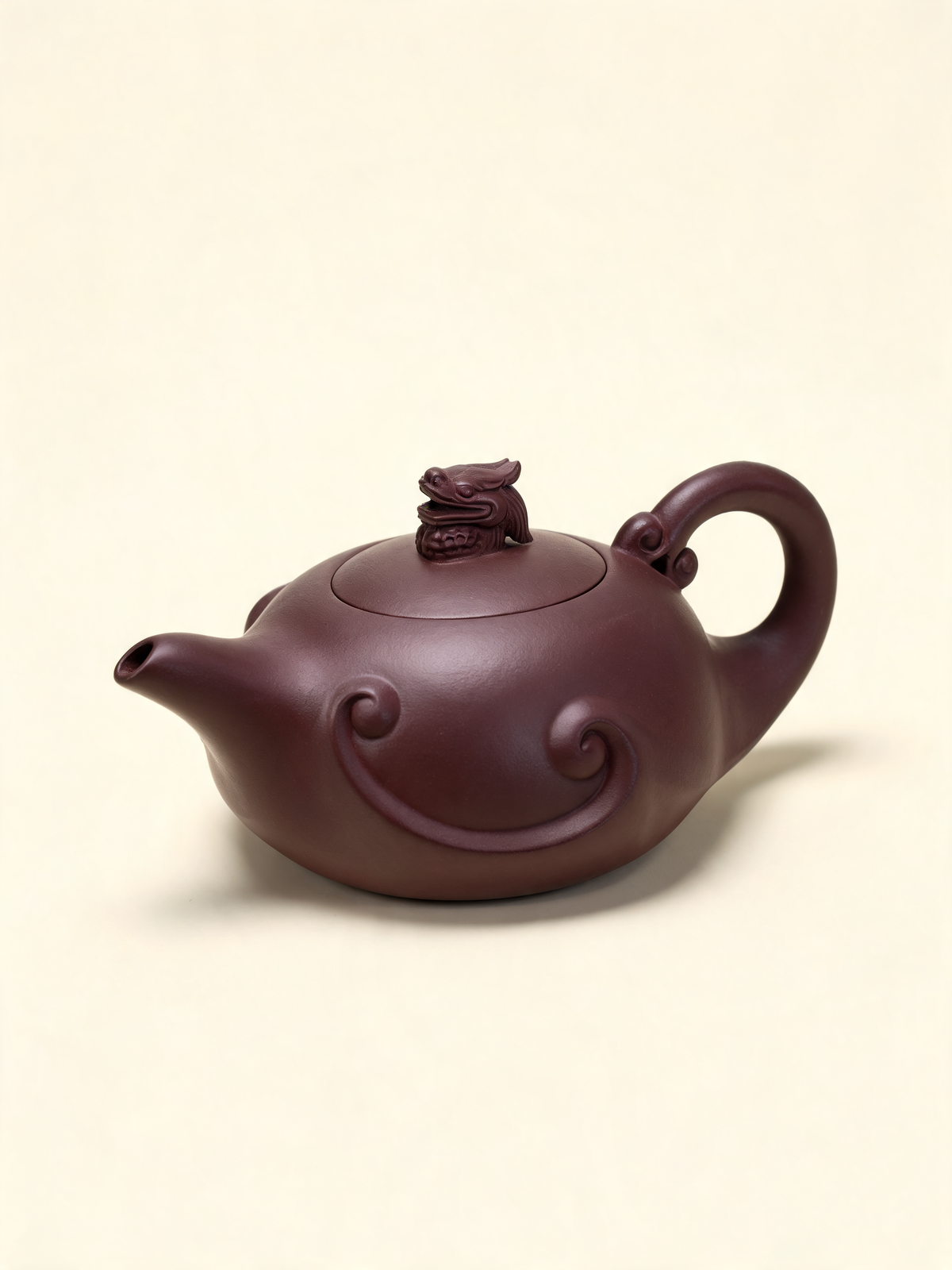 Detail of the layered wave carving on the Long Ying Teapot body