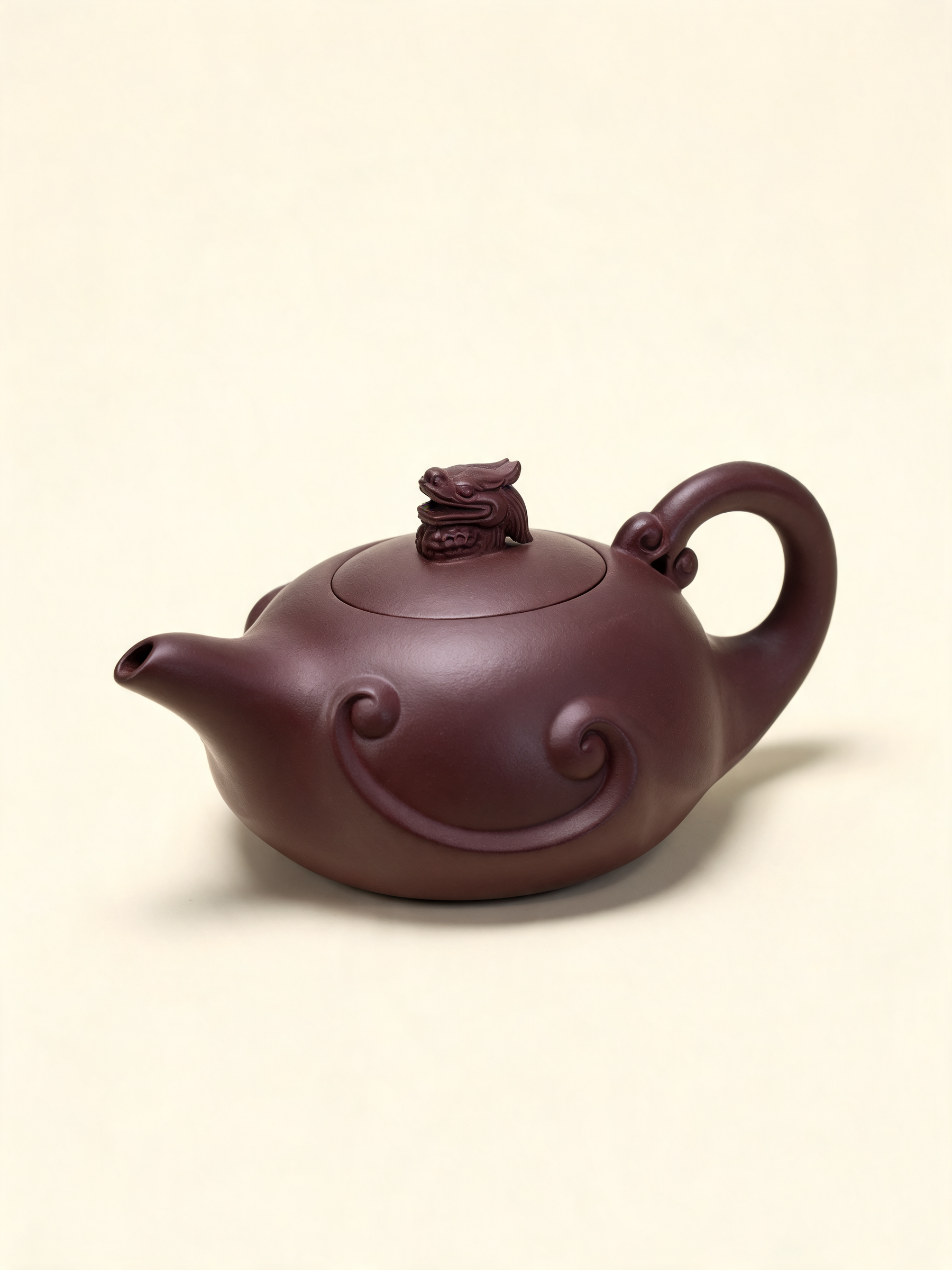 Detail of the layered wave carving on the Long Ying Teapot body