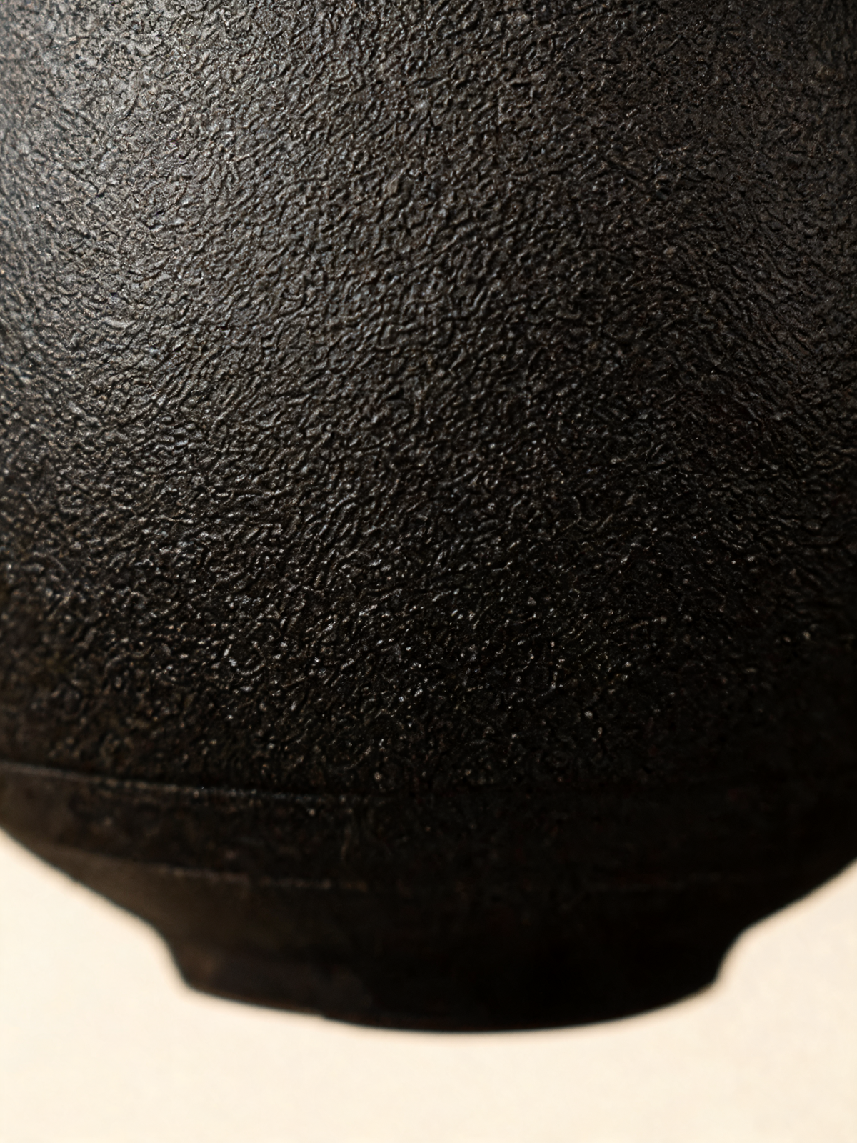 Detail of the deep Reef Black matte granular surface