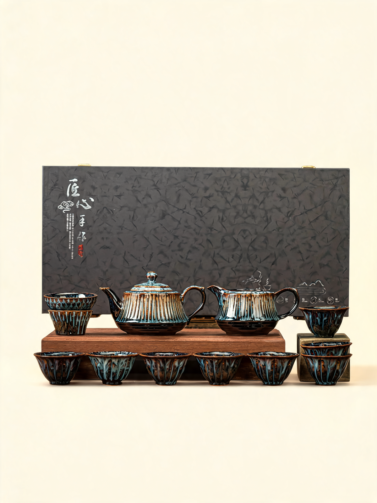Xingyun ribbed teapot with reactive rust-to-blue glaze